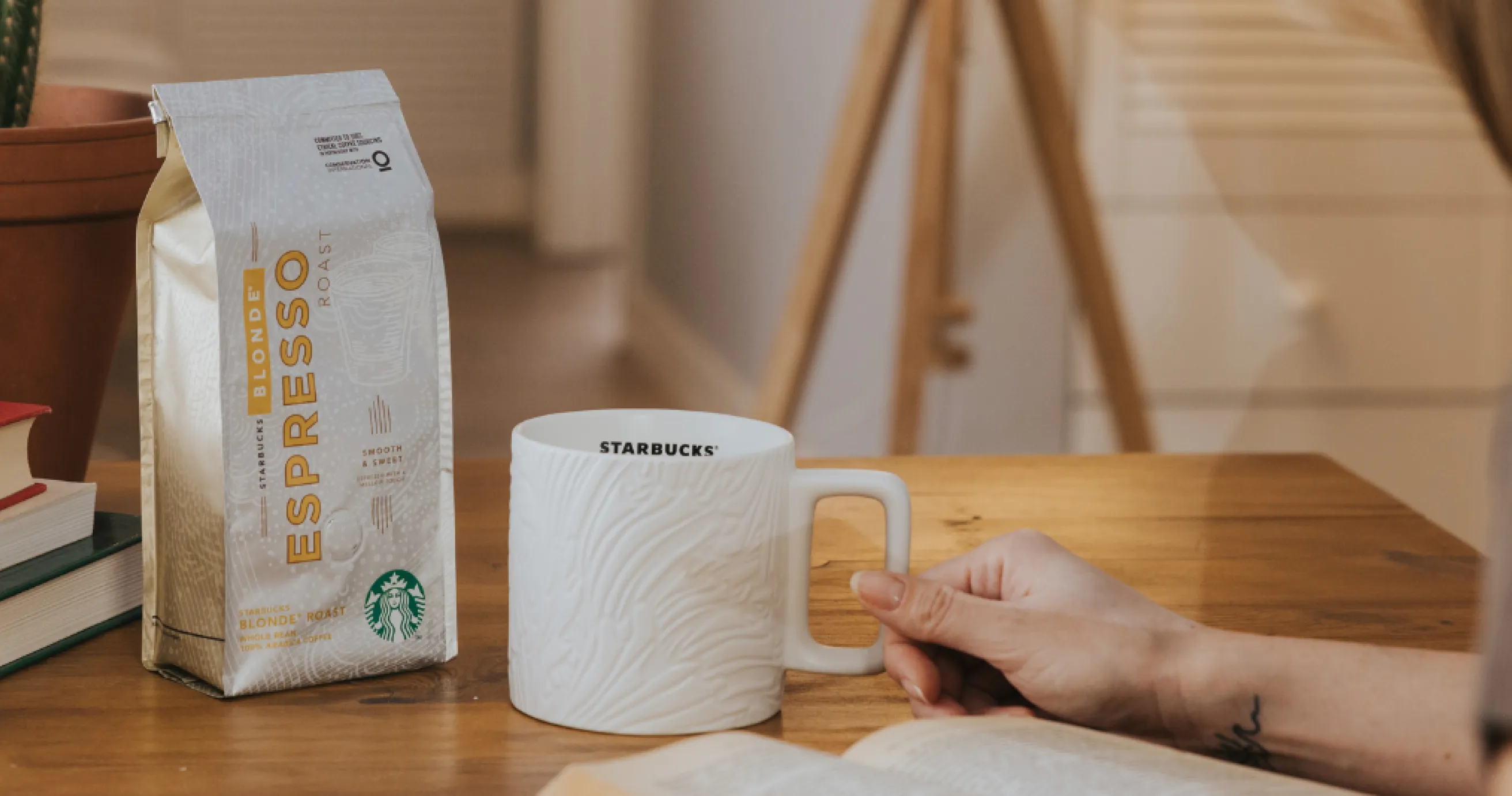 Our coffees at home, a coffee package, a coffee cup